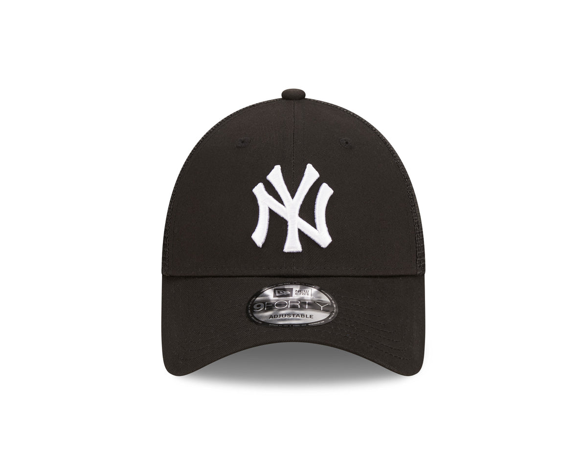 New York Yankees Home Field Black New Era 9FORTY A-Frame Trucker Cap, front view showing the raised white embroidered NY logo on the structured black front panel, with a curved black visor and a 9FORTY size sticker.