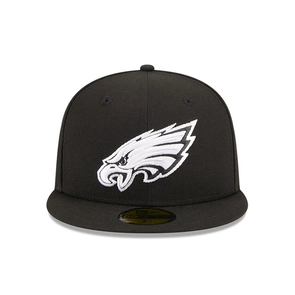 Philadelphia Eagles NFL Evergreen Black New Era 59FIFTY Fitted Cap, front view showing the white embroidered Eagles logo on the structured black crown above a flat visor with the gold 59FIFTY size sticker.