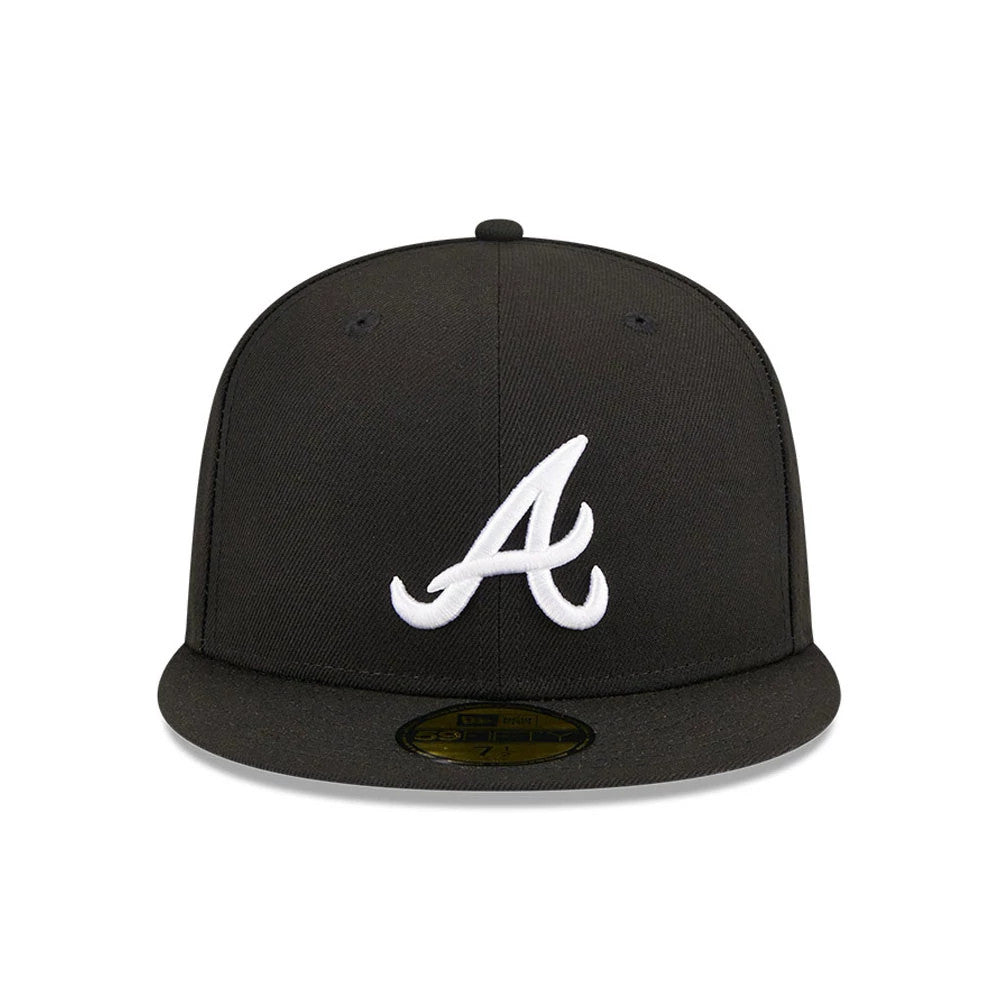 Atlanta Braves MLB Evergreen Black New Era 59FIFTY Fitted Cap, front view with a white raised embroidered A logo on the front panel, coordinated black flat visor, and gold 59FIFTY size sticker on the top of the visor.
