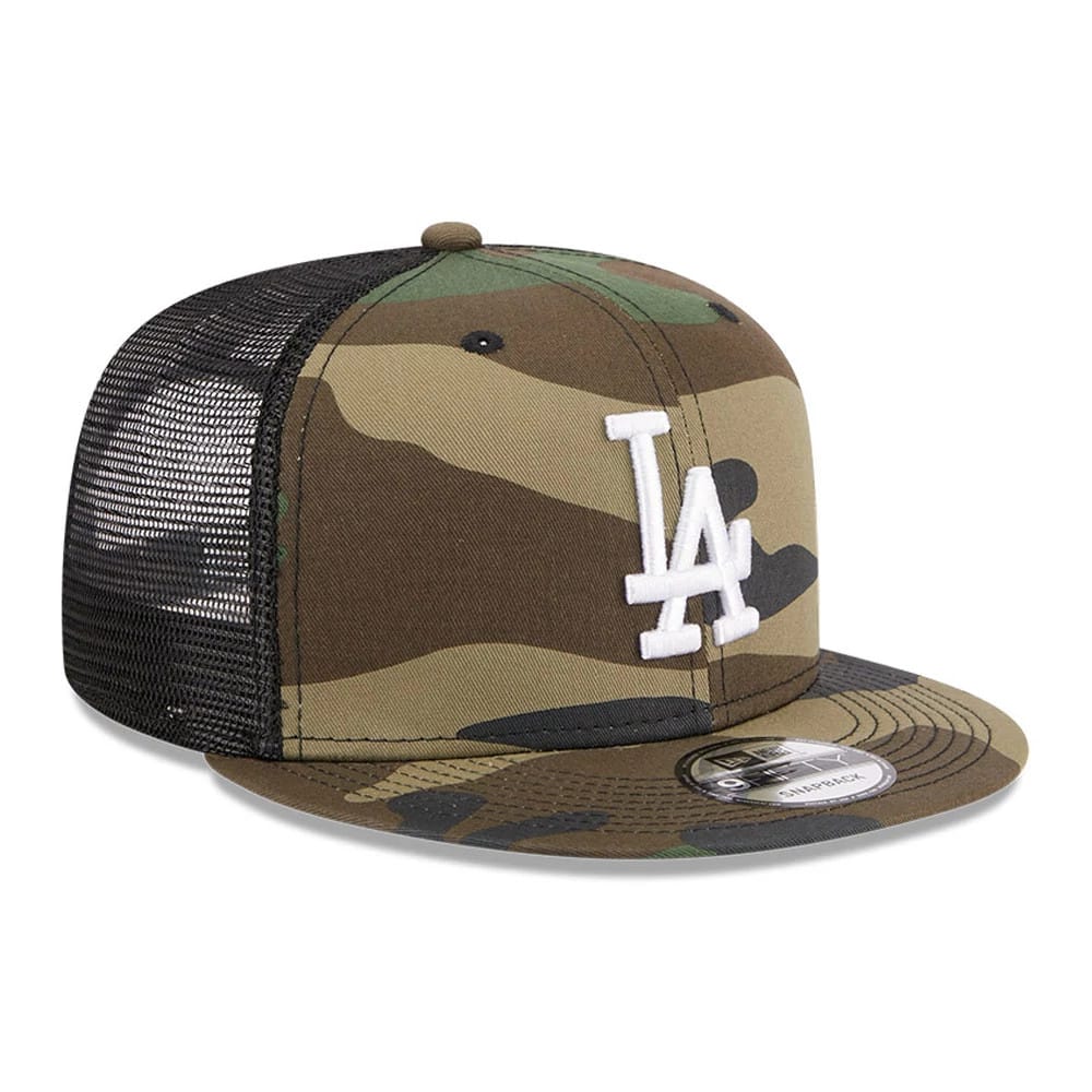 LA Dodgers MLB Evergreen Camo New Era 9FIFTY Trucker Adjustable Cap, front view showing a white raised LA logo on the camouflage front panel, with a black mesh rear, flat visor and a 9FIFTY size sticker on the visor.