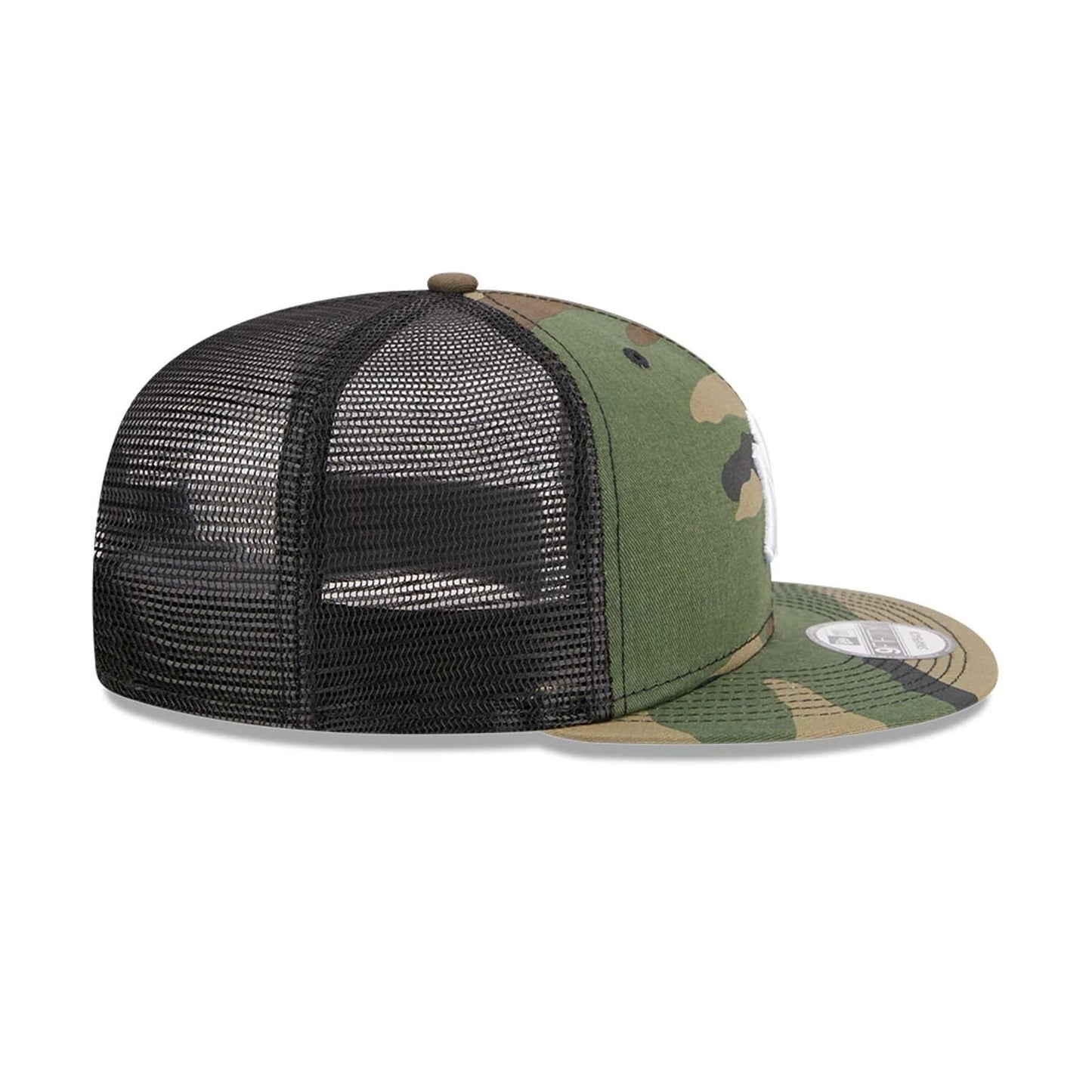 New York Yankees MLB Evergreen Camo New Era 9FIFTY Trucker Adjustable Cap, side view showing black mesh back panels with a structured camo crown and top button, the white Yankees logo on the front, and the 9FIFTY size sticker on the visor.