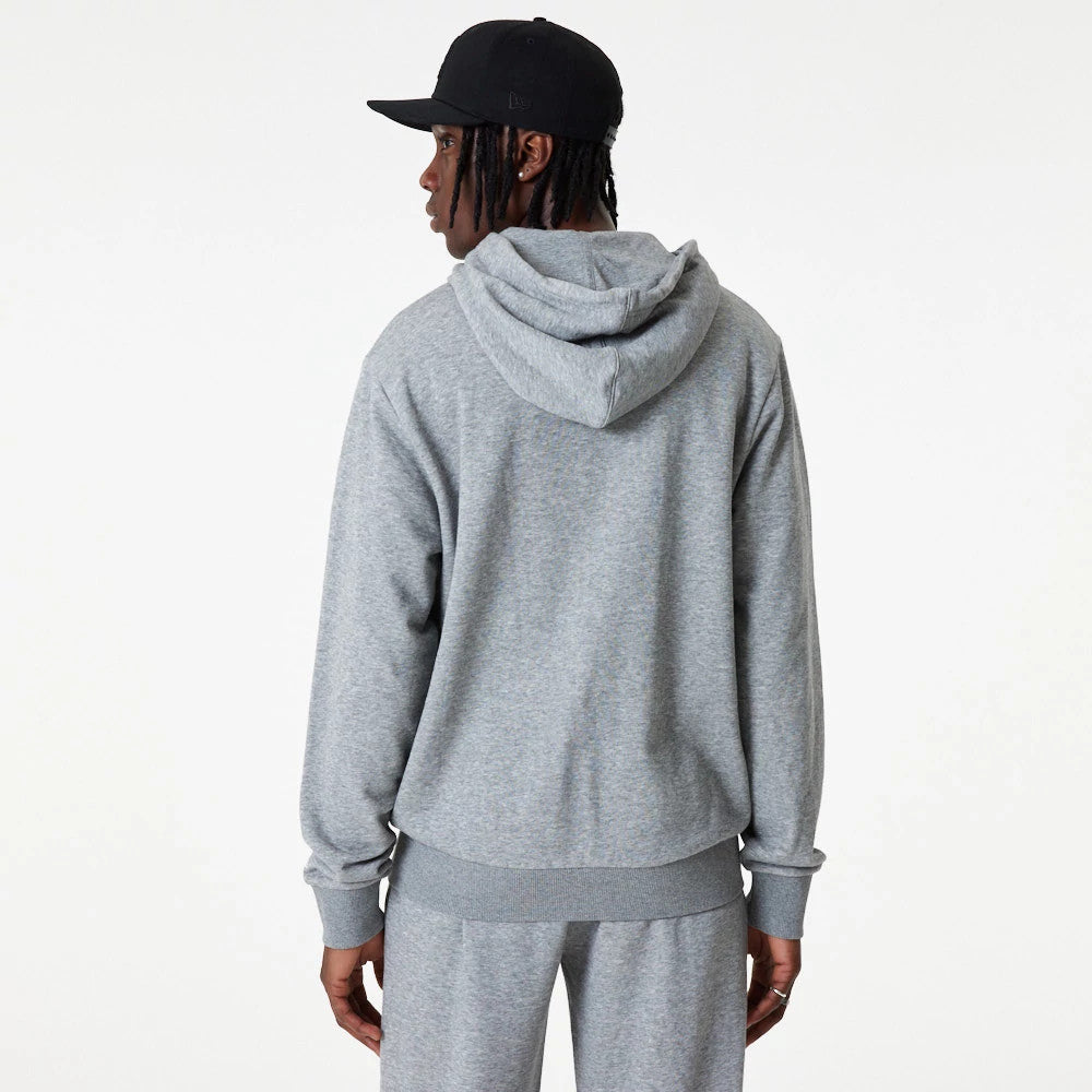 New York Yankees MLB Essential Grey Full Zip Hoodie, rear view showing the plain grey back with the hood resting flat, ribbed cuffs and hem, worn by a person also wearing a black cap.