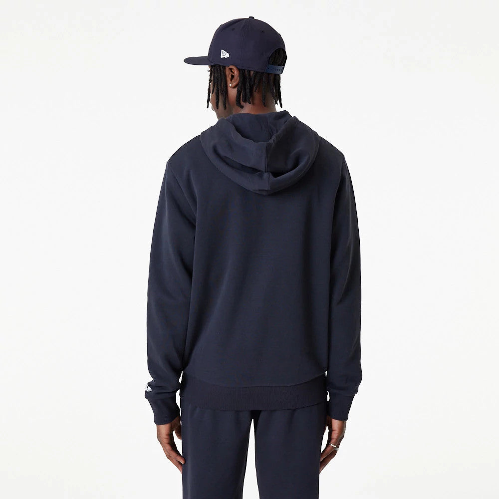 New York Yankees MLB Essential Navy Full Zip Hoodie, rear view showing the navy hoodie with a relaxed fit, the hood resting at the back of the neck, and a white embroidered New Era logo on the left sleeve cuff.
