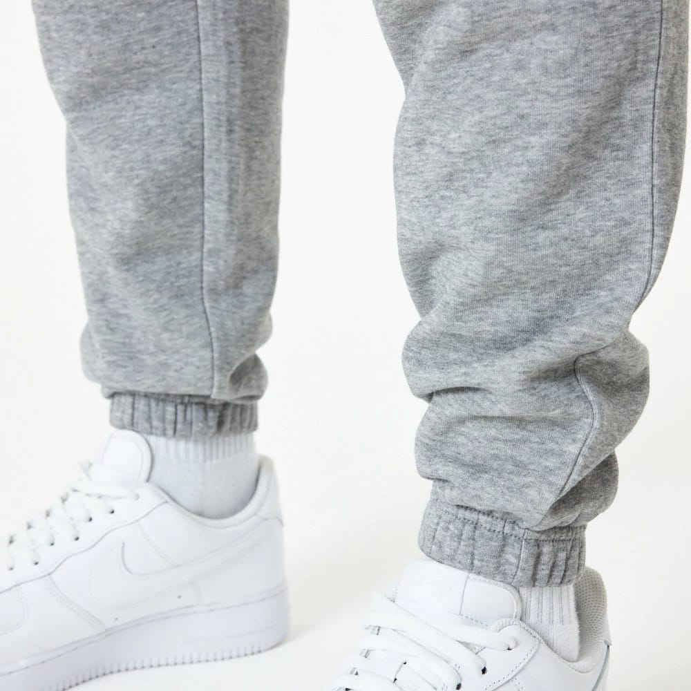 The Male model is wearing LA Lakers NBA Essential Grey Joggers 3