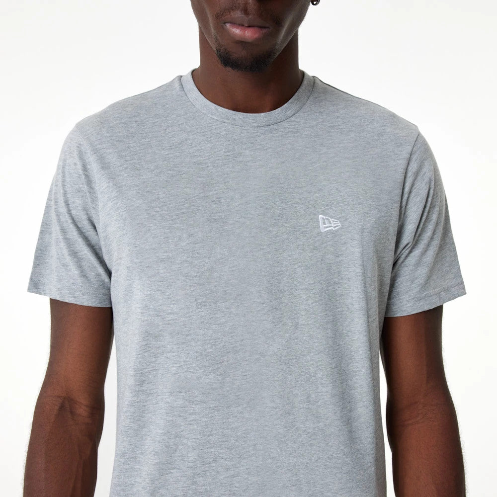 New Era Essential Grey T-Shirt, front view showing a light grey T-shirt with a small white embroidered New Era logo located on the left chest, featuring short sleeves and a round neckline.