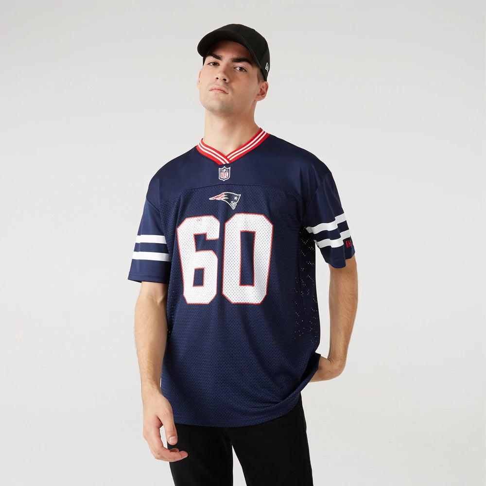 New England Patriots NFL Dark Blue Mesh T-Shirt, on-model view showing a large white number 60 on the chest, the Patriots logo above it, and red details on the collar, worn by a person in a black cap.
