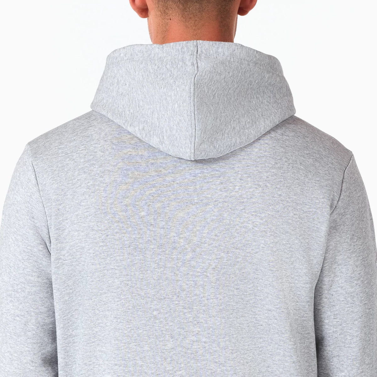 NFL Shield Logo NFL Grey Pullover Hoodie, rear view showing the plain light grey fabric, with a spacious hood slightly draped over the back and no visible logos or designs on the back panel.