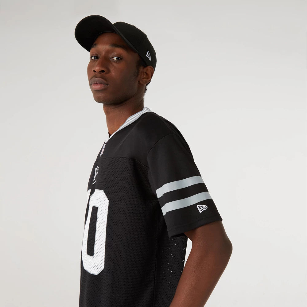 Las Vegas Raiders NFL Black Mesh T-Shirt, side view showing the black t-shirt with the number 00 in white on the back, grey and white stripes on the sleeves, and a raised New Era logo on the left sleeve.