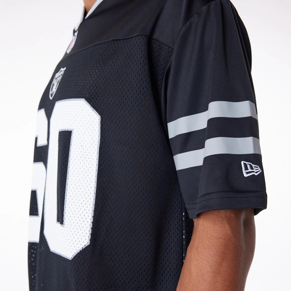 Las Vegas Raiders NFL Black Mesh T-Shirt, side view showing grey stripes on the sleeve, a white raised New Era logo near the cuff, and part of the large white number 60 with the team logo on the chest.