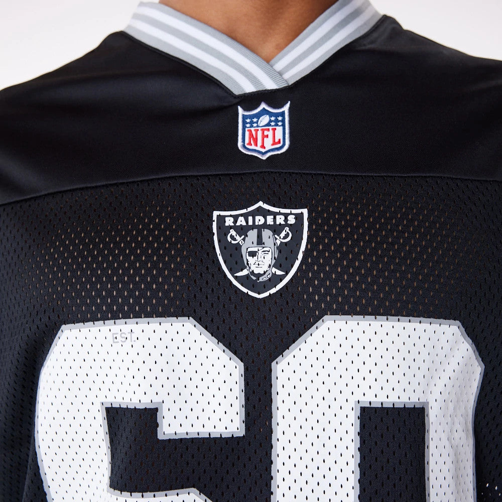 Las Vegas Raiders NFL Black Mesh T-Shirt, front view showing the embroidered NFL logo on the grey-striped collar, with the Raiders shield centred below on the perforated black fabric above large white numbers.