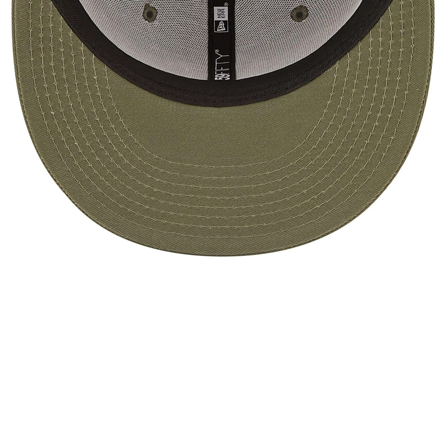 New York Yankees League Essential Green New Era 59FIFTY Fitted Cap, inside view showing black taping with white 59FIFTY branding, a grey sweatband, and olive undervisor, all centred within the structured crown.