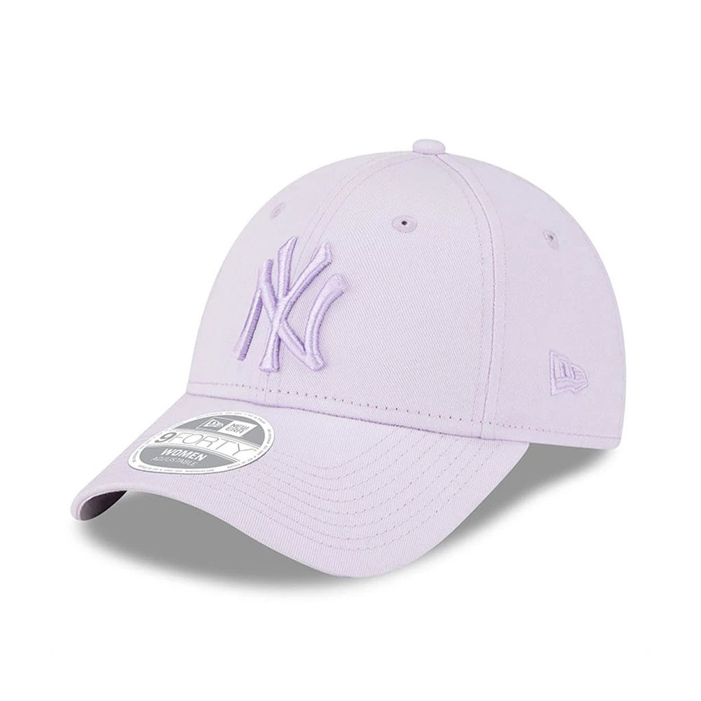 New York Yankees Womens League Essential Lilac New Era 9FORTY Adjustable Cap, three-quarter view showing the raised lilac NY logo on the front panel, with a curved visor and a 9FORTY size sticker, and the New Era flag logo on the left side.