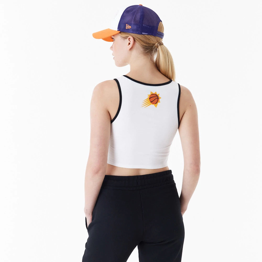 Phoenix Suns Womens NBA Team Wordmark White Crop Tank Top, back view on a model wearing black pants and a purple and orange cap, featuring the Suns logo printed below the neckline.