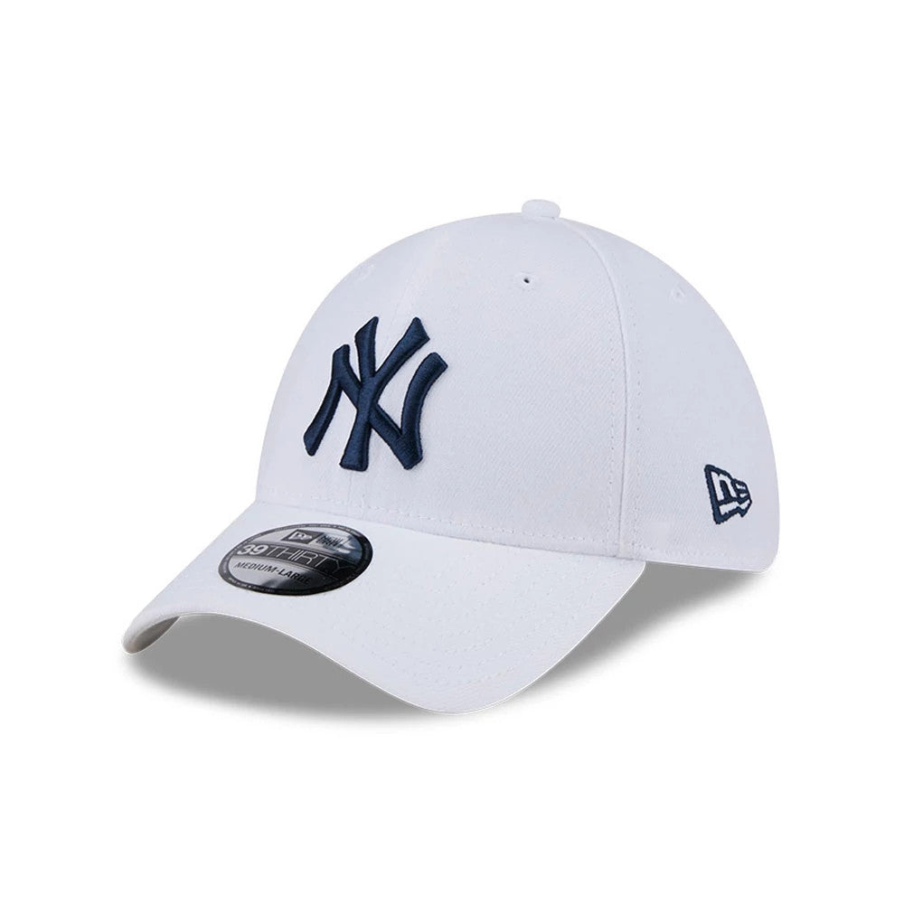 New York Yankees MLB Evergreen White New Era 39THIRTY Stretch Fit Cap, three-quarter view showing a raised navy NY logo on the front panel, curved white visor with 39THIRTY size sticker, and New Era flag logo on the left side.