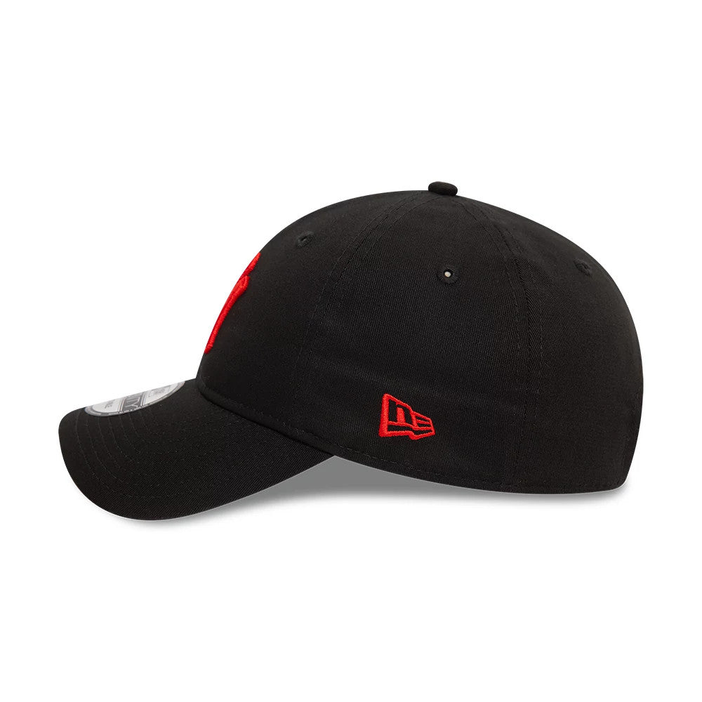 New York Yankees League Essential Black New Era 9TWENTY Adjustable Cap, side view showing the red New Era flag logo on the left side and the curved visor with a 9TWENTY size sticker on the top.