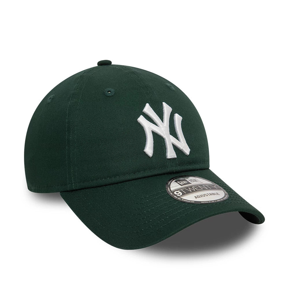 New York Yankees League Essential Dark Green New Era 9TWENTY Adjustable Cap, front view with a white raised embroidered NY logo on the dark green crown and a 9TWENTY size sticker on the gently curved visor.