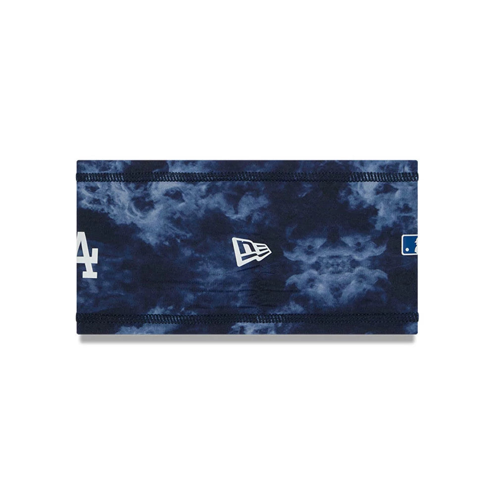 New Era LA Dodgers MLB Clubhouse Grey Headband, front view showing the white LA logo on the left and the New Era flag logo in the centre, set against a cloudy blue and grey patterned fabric.