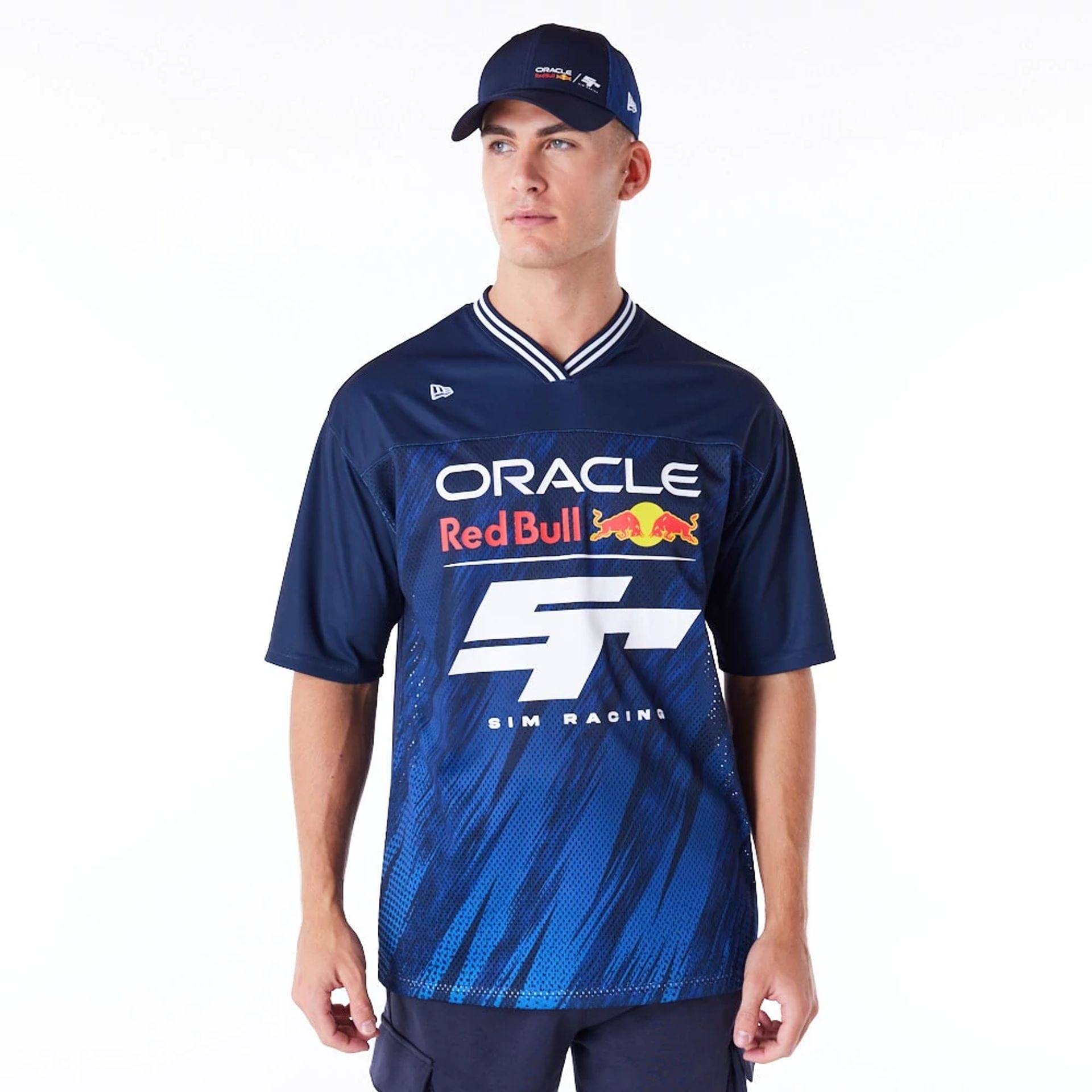 The Male model is wearing Red Bull Sim Racing Navy V Neck Jersey 1