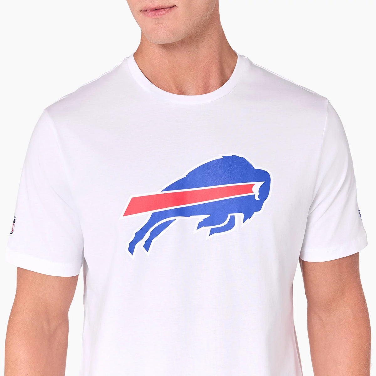 New Era Buffalo Bills NFL White T-Shirt, front view showing a large blue and red buffalo logo printed across the chest, part of the New Era flag on the sleeve of the plain white tee.