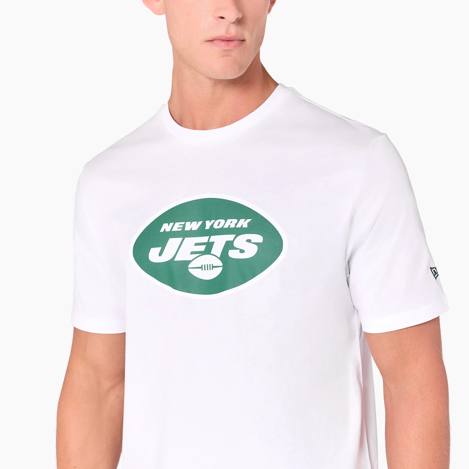 New Era New York Jets NFL White T-Shirt, front view showing a large green and white team logo centred on the chest with a raised New Era logo on the left sleeve against the plain white fabric.