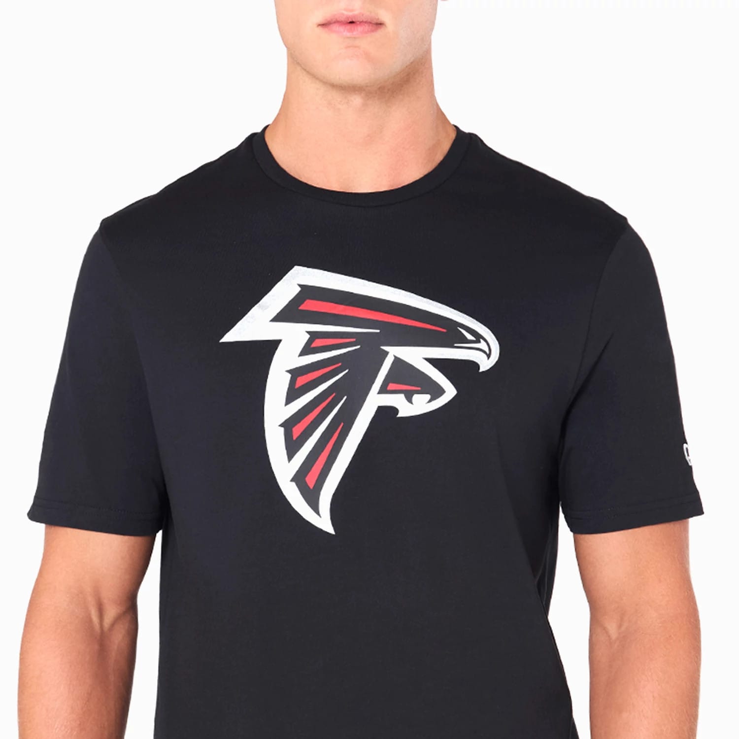 New Era Atlanta Falcons NFL Black T-Shirt, front view showing the large printed Atlanta Falcons logo in red, white, and grey centred on the chest, with a small embroidered New Era logo on the upper left sleeve.