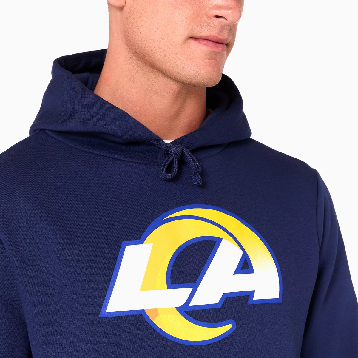 New Era LA Rams NFL Navy Pullover Hoodie, front view showing the large printed LA Rams logo on the chest in blue, white, and yellow, with an adjustable drawstring on the navy hood.