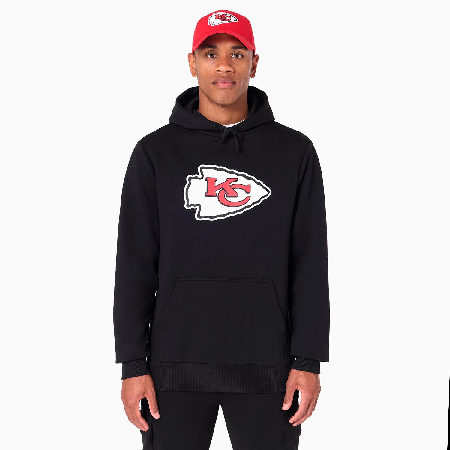 New Era Kansas City Chiefs NFL Black Pullover Hoodie, front view displaying the large embroidered team logo on the chest, black drawstring hood, and a kangaroo pocket on the lower front.