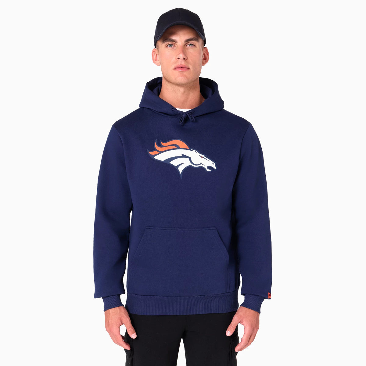 New Era Denver Broncos NFL Navy Pullover Hoodie, on-model view showing the navy hoodie with a large Denver Broncos logo printed on the front, a spacious kangaroo pocket at the lower half and a drawstring hood.