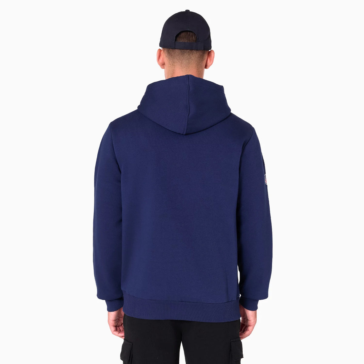 New Era Denver Broncos NFL Navy Pullover Hoodie, rear view showing the plain navy fabric with a fitted hood and ribbed hem, on-model wearing a navy cap with a debossed logo on the back above the adjustable strap.