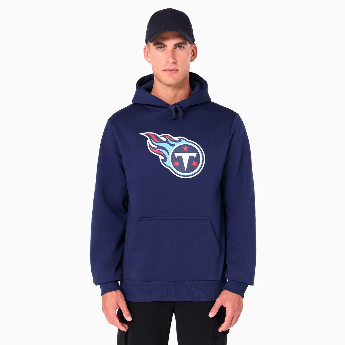 New Era Tennessee Titans NFL Navy Pullover Hoodie, on-model view showing the large team logo printed on the chest, a spacious front pocket, long sleeves with ribbed cuffs, and an adjustable drawstring hood.