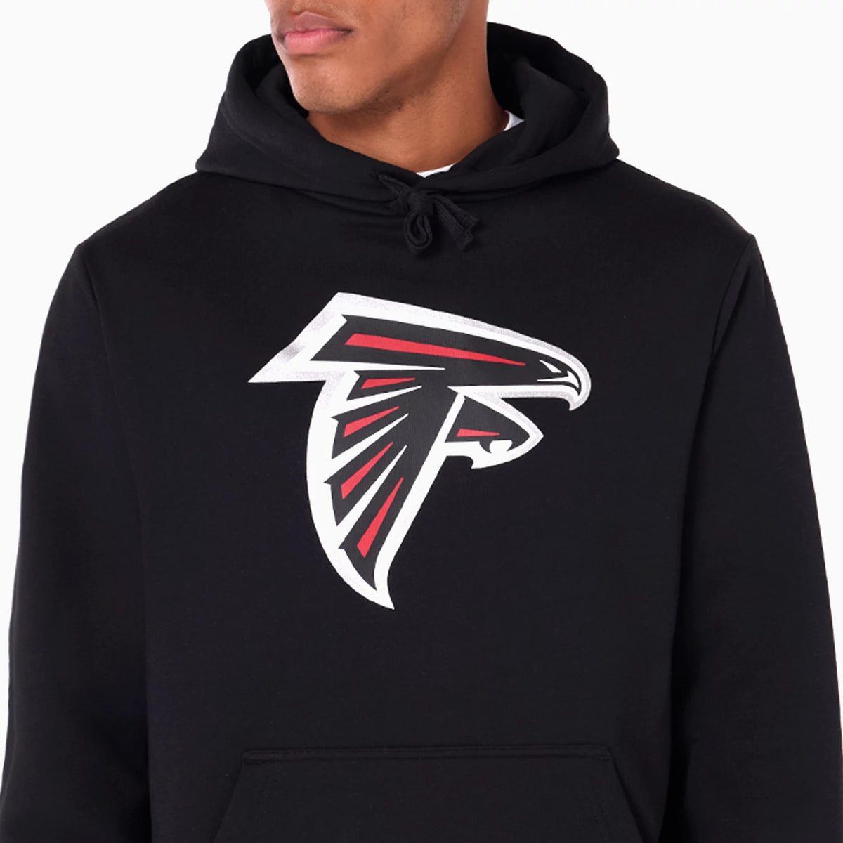 New Era Atlanta Falcons NFL Black Pullover Hoodie, front view showing the large raised Falcons logo in white and red centred on the chest of the black fabric, with a drawstring hood and a kangaroo pocket below.
