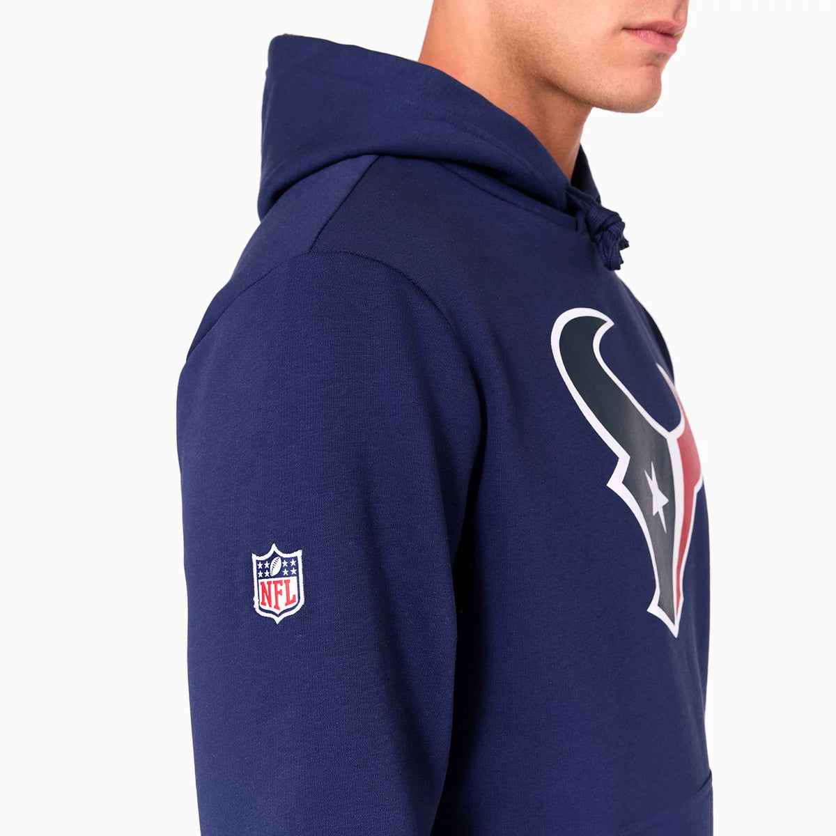 New Era Houston Texans NFL Navy Pullover Hoodie, side view showing the large team logo in red, white, and navy on the chest, with an embroidered NFL badge on the sleeve and a drawstring hood.