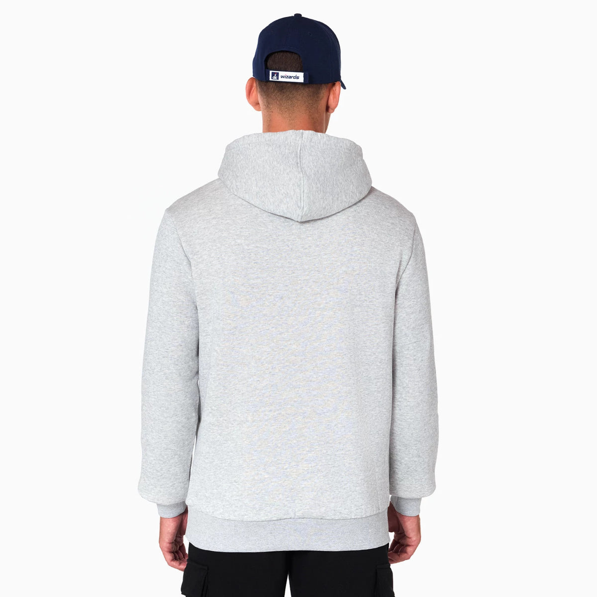 New Era Washington Wizards NBA Grey Pullover Hoodie, rear view showing the light grey fabric with an attached hood at the back of the head and long sleeves, on a person wearing a dark blue cap with a white debossed Wizards logo on the closure.