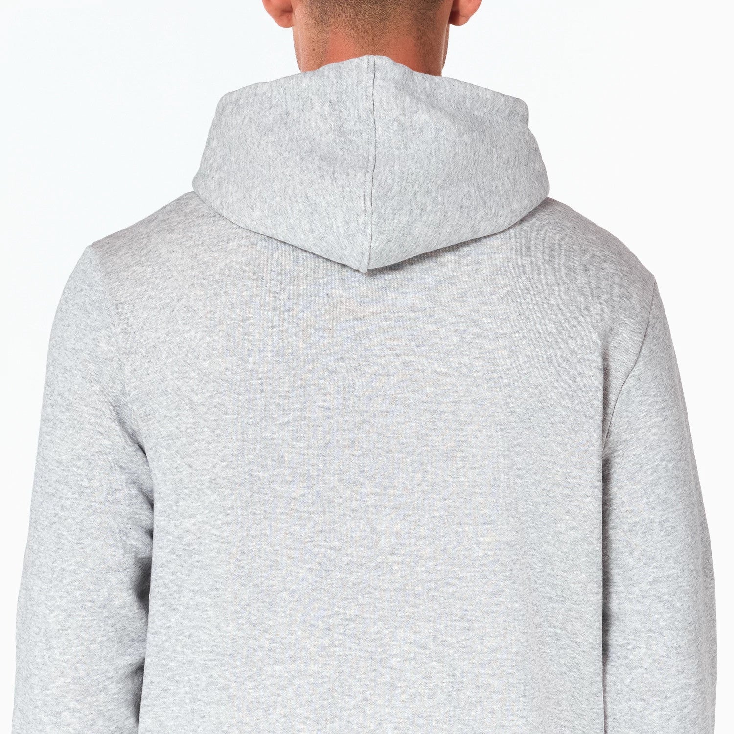 New Era Dallas Mavericks NBA Grey Pullover Hoodie, rear view showing the plain grey fabric with a hood resting on the upper back and shoulders, extending smoothly into long sleeves.