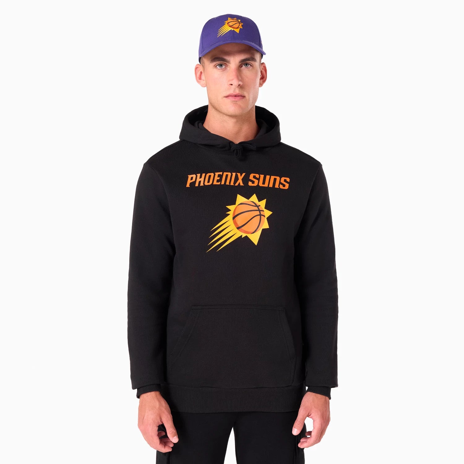 New Era Phoenix Suns NBA Black Pullover Hoodie, on-model view showing the black hoodie with the orange and yellow Phoenix Suns logo across the chest, paired with a purple cap featuring the same logo embossed at the front.