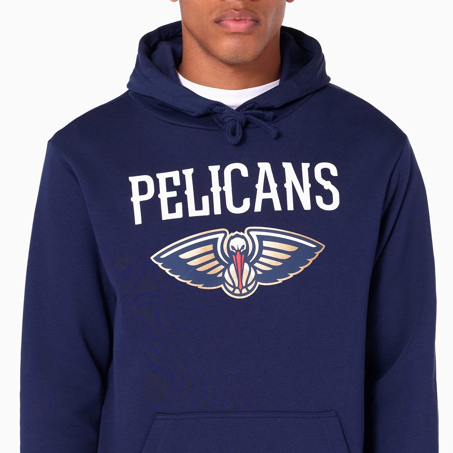 New Era New Orleans Pelicans NBA Navy Pullover Hoodie, front view displaying a navy hoodie with PELICANS in white letters above the team logo, featuring an intricate pelican design centred on the chest.
