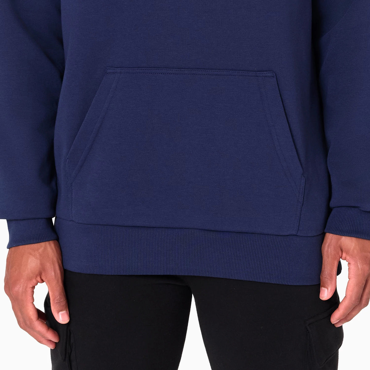 New Era Philadelphia 76ers NBA Navy Pullover Hoodie, front view showing a large kangaroo pocket on the navy torso, ribbed cuffs and hem, with the edge of the sleeves slightly gathered at the wrists.