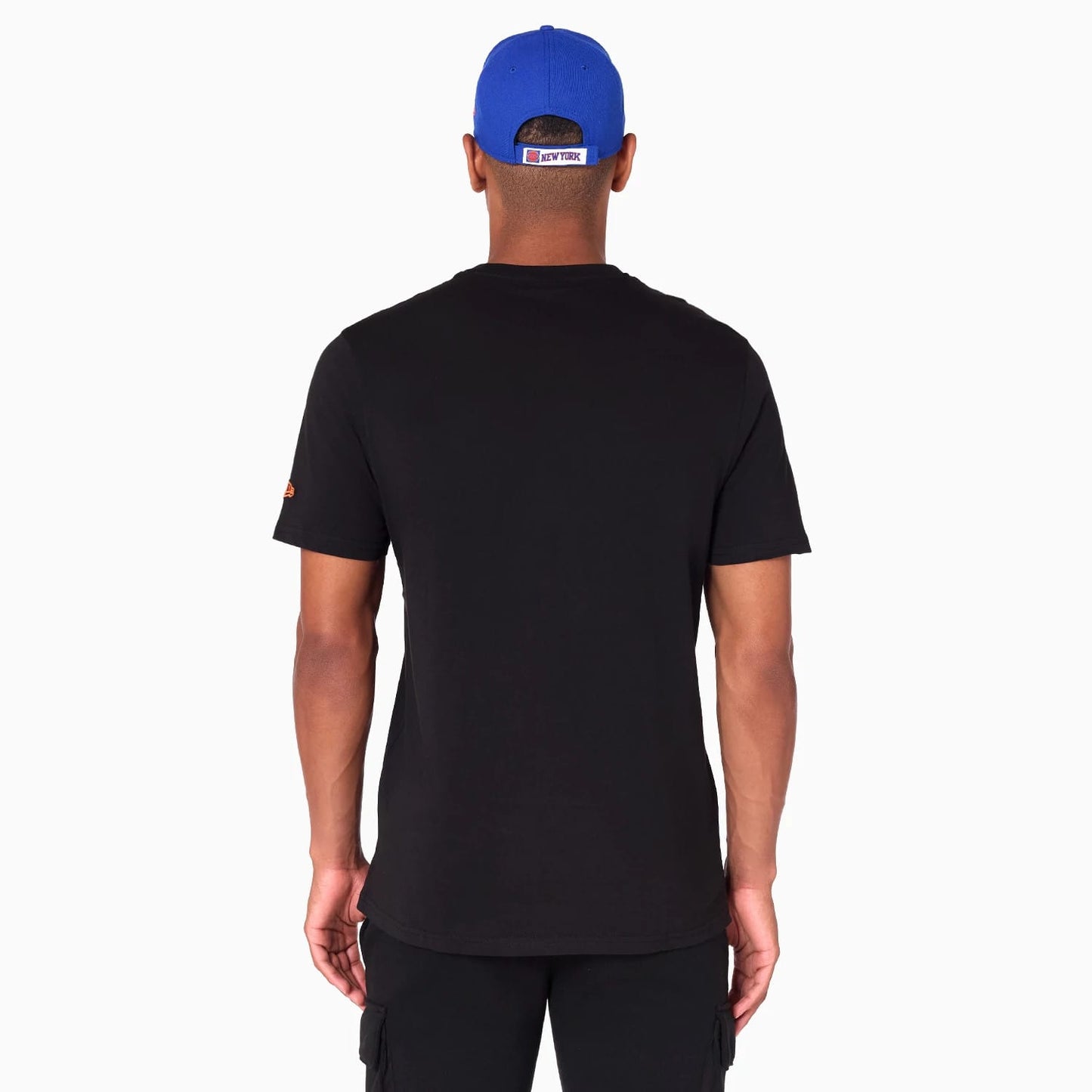 The Male model is wearing New York Knicks NBA Black T-Shirt 7