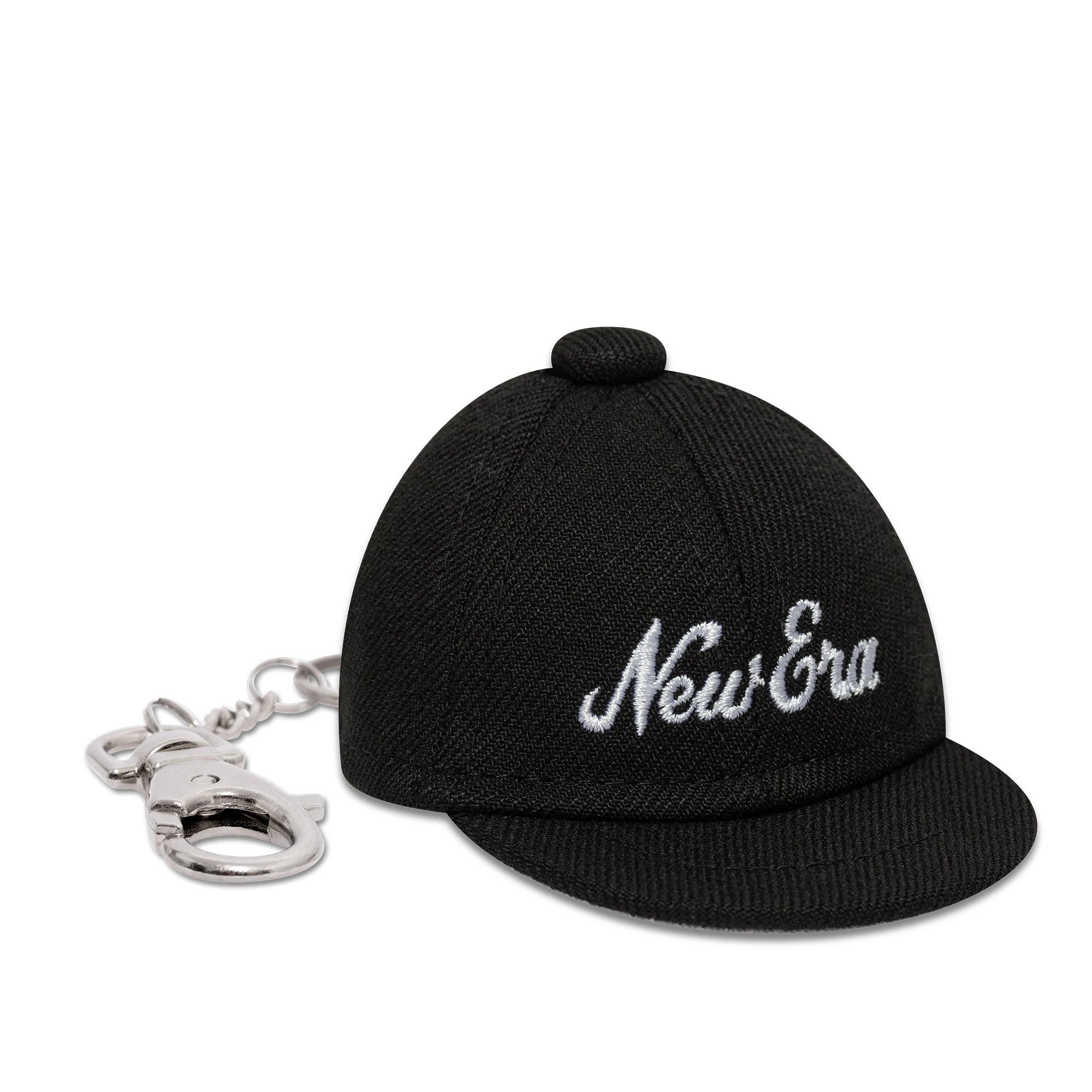 New Era New Era Mini Cap Black Key Chain, side view showing the embroidered New Era script logo on the front panel, featuring a black visor and a silver keychain attached to the back.