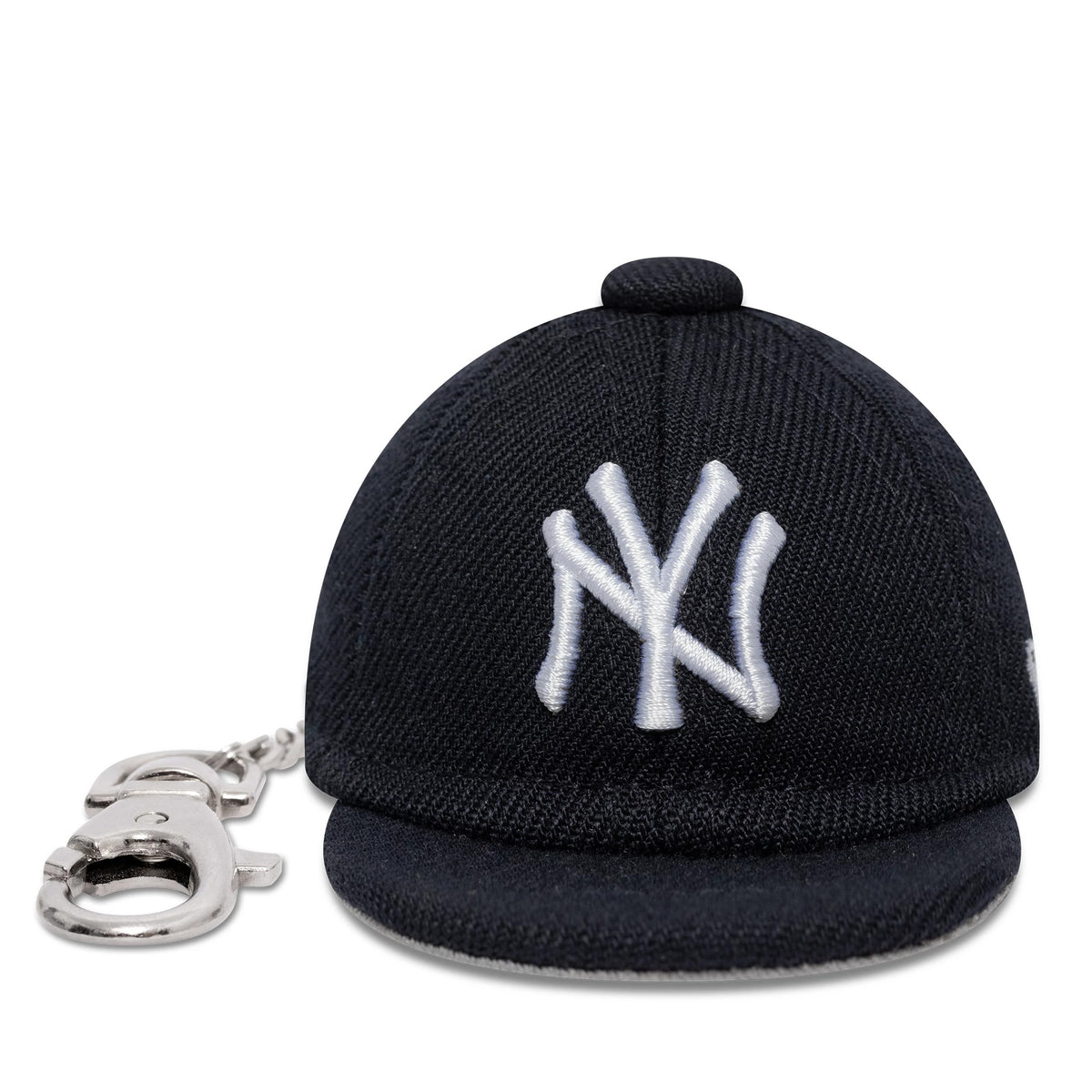 New Era New York Yankees MLB Mini Cap Navy Key Chain, front view showing the white embroidered NY logo on the structured mini navy crown with a silver keychain clasp attached to the back.