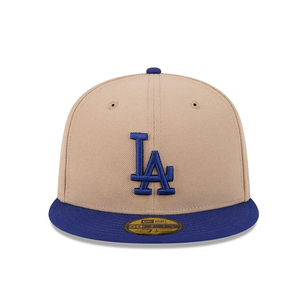 LA Dodgers MLB Evergreen Light Beige New Era 59FIFTY Fitted Cap, front view with a raised blue embroidered LA logo on the centre of the light beige crown, featuring a blue visor and a gold 59FIFTY size sticker on top.