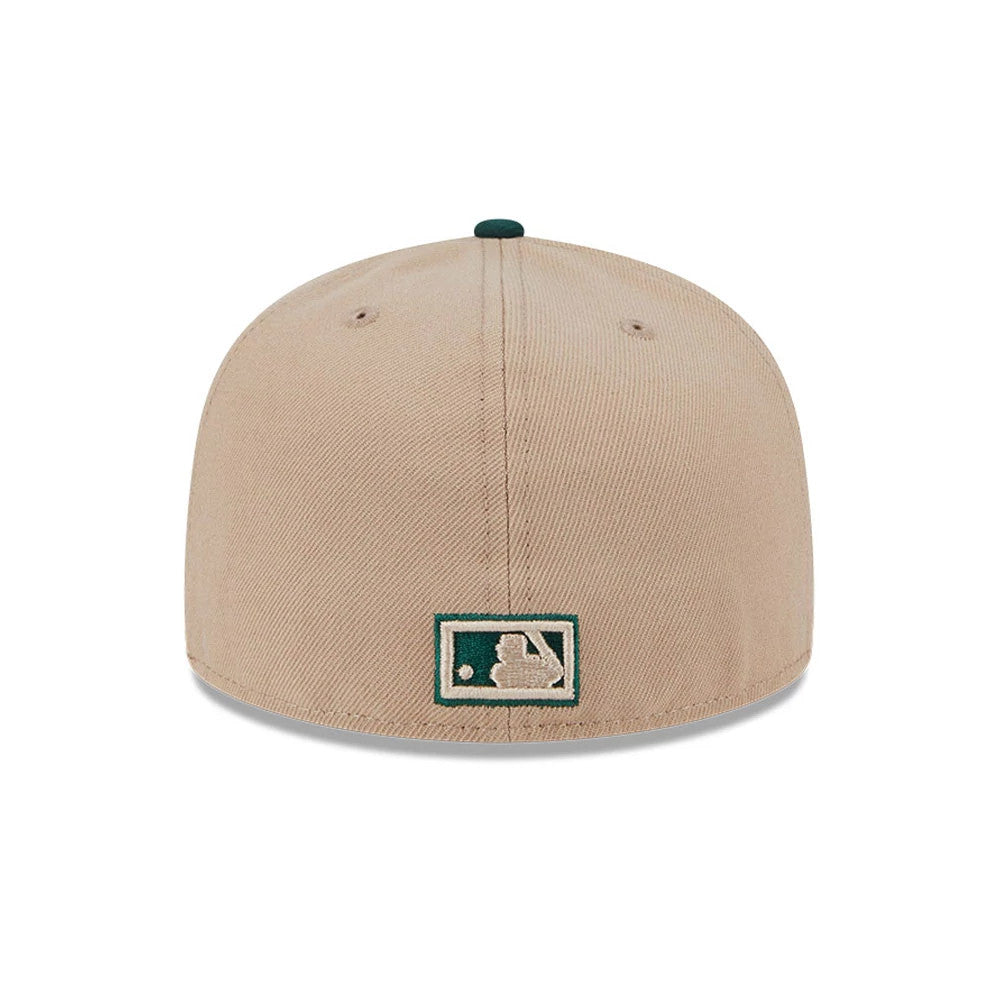 Pictured is this MLB Evergreen Athletics 59FIFTY Fitted cap in light beige. 7