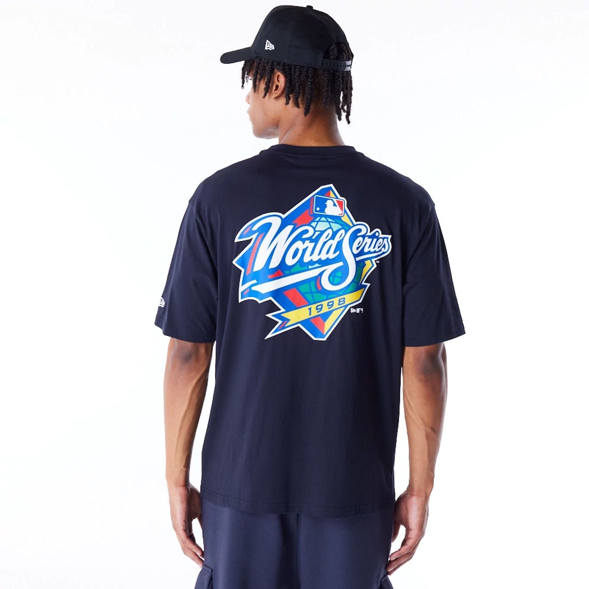 The Male model is wearing New York Yankees MLB World Series Navy Oversized T-Shirt 1