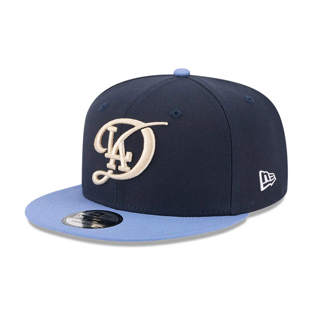 Pictured is this MLB Evergreen LA Dodgers 9FIFTY Snapback cap in dark blue. 1