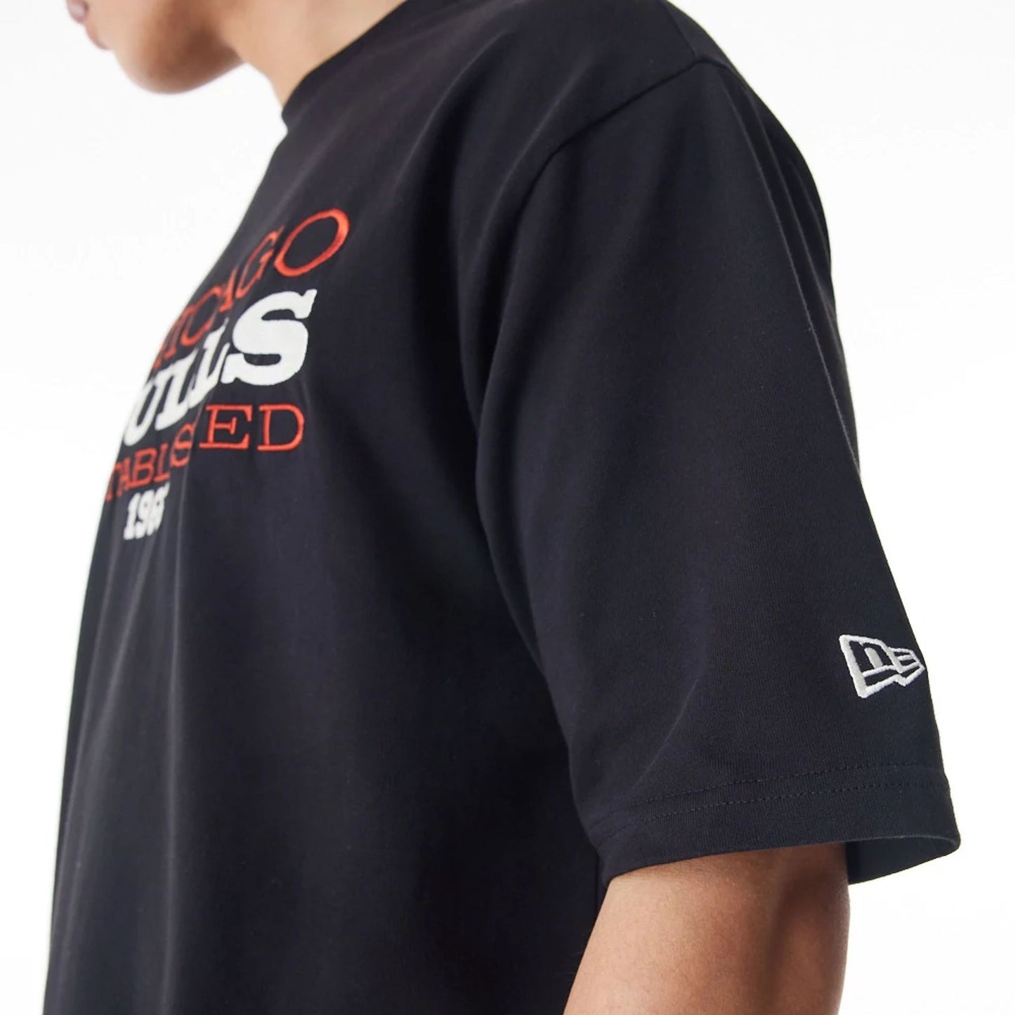 The Male model is wearing Chicago Bulls NBA Lifestyle Black T-Shirt 6