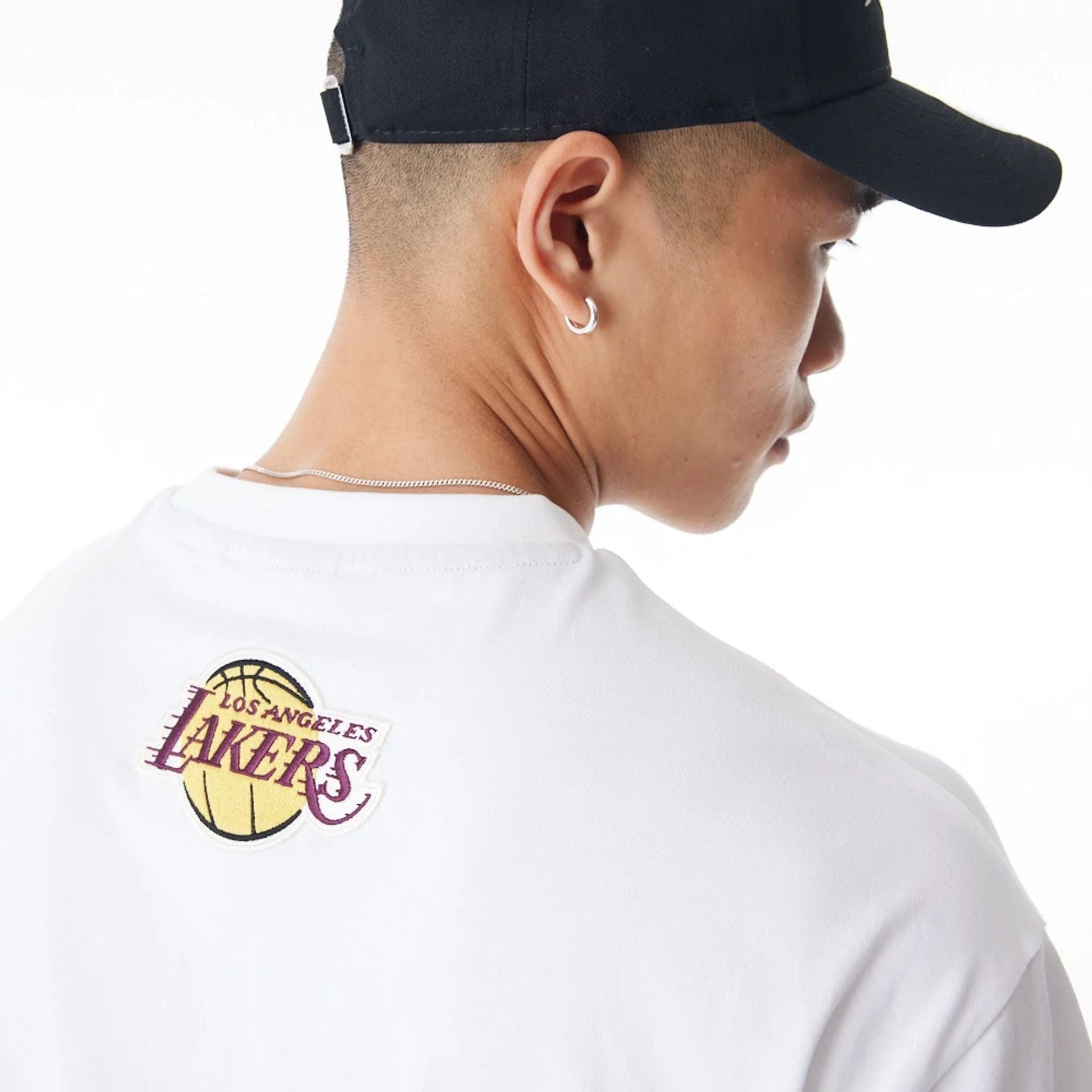 The Male model is wearing LA Lakers NBA Lifestyle White T-Shirt 2