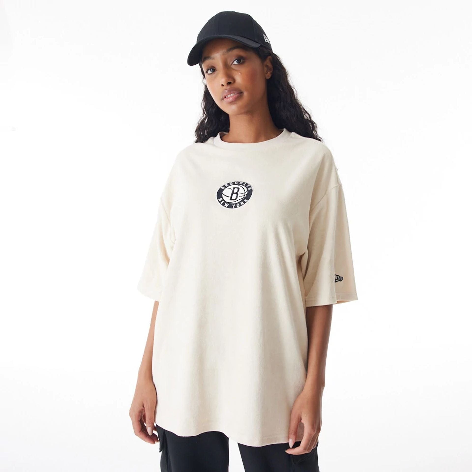 The Male model is wearing Brooklyn Nets NBA Lifestyle Velour Light Beige Oversized T-Shirt 2