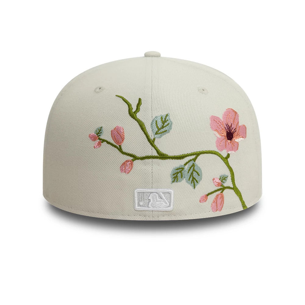 New York Yankees MLB Floral Light Beige New Era 59FIFTY Fitted Cap, rear view showing the white embroidered MLB Batterman logo at the centre back, surrounded by pink floral embroidery with green leaves on the beige crown.