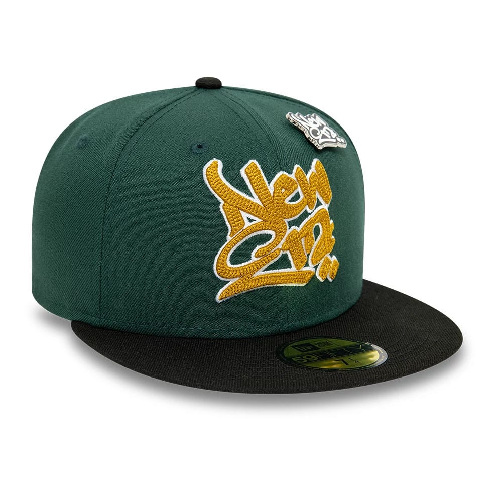 New Era Front Script Dark Green & Black New Era 59FIFTY Fitted Cap, three-quarter view with raised yellow New Era script embroidery on the front panel, a black flat visor, and a gold 59FIFTY size sticker on the visor.