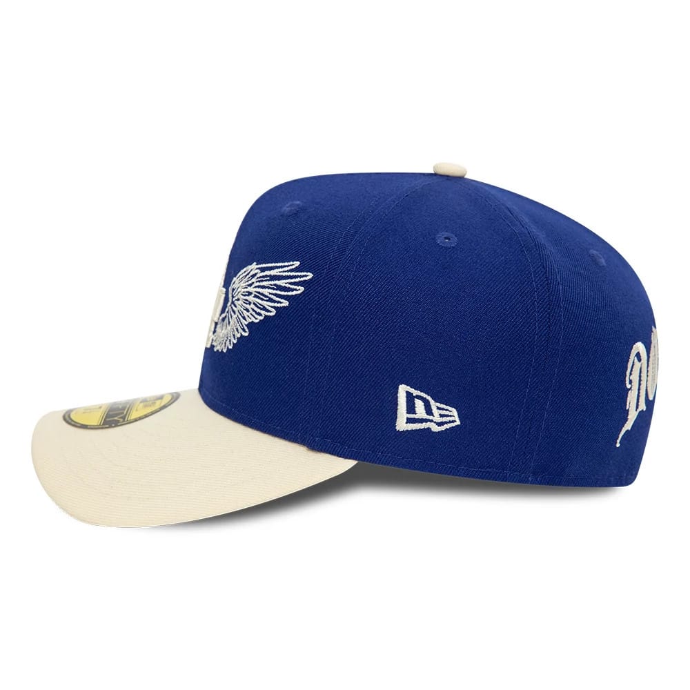 LA Dodgers MLB Team Wings Navy New Era 59FIFTY Fitted Cap, side view showing the white wing embroidery on the front panel, the New Era flag logo on the left side, and the gold 59FIFTY size sticker on the cream visor.